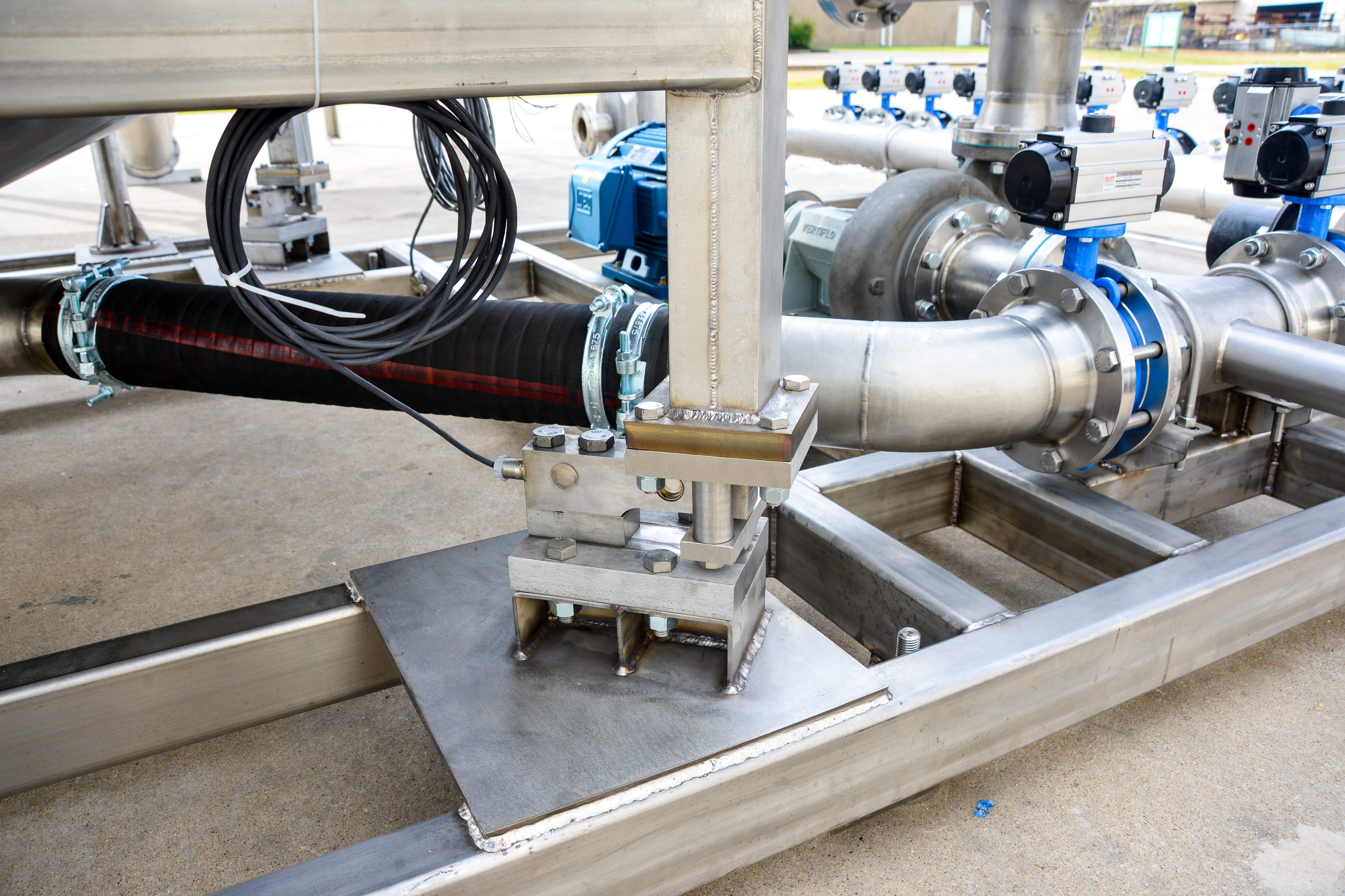 Close up of J.May Mixing System parts